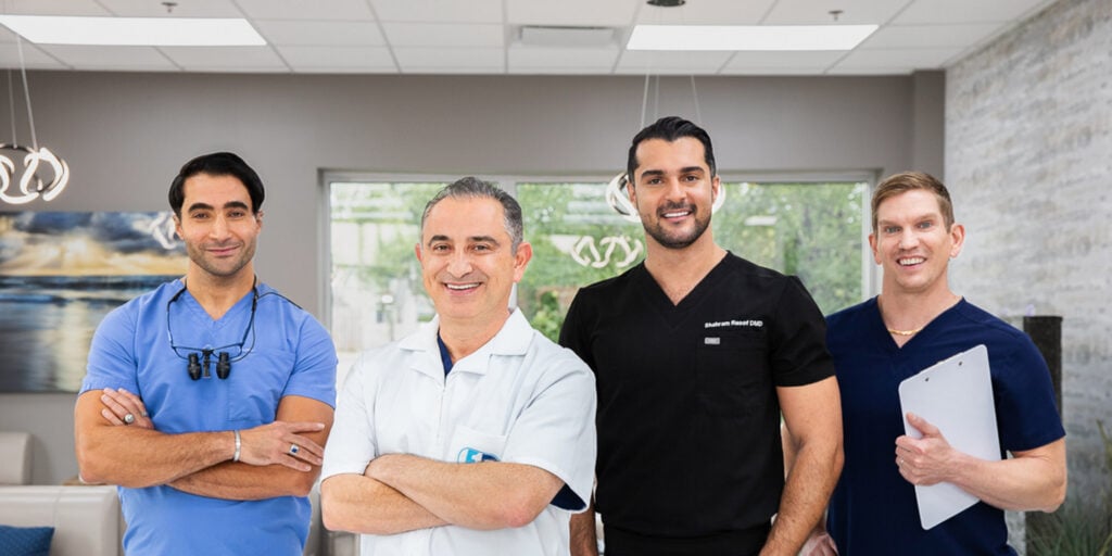 4 Dental Implant Surgeons At 1st Family Dental Implant Centers Posing Together